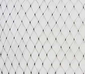 A piece of black diamond extruded bird netting on the white background.
