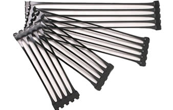 Four different sizes of uniaxial plastic geogrid on the white background.